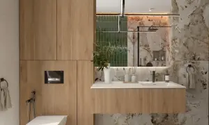 Nowoczesny **projekt łazienki online**: drewniane szafki, wisząca toaleta, umywalka i lustro z podświetleniem. Marmurowe płytki dodają elegancji.