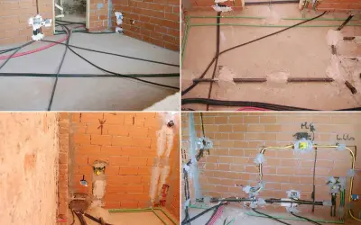 Budowa domu w toku: instalacje elektryczne i hydrauliczne, w tym rury **propanu**, czekają na wykończenie.