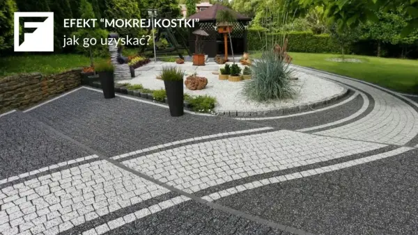 Nowoczesna ścieżka z kostki brukowej w odcieniach szarości i bieli, z elementami kamiennymi i zielenią.